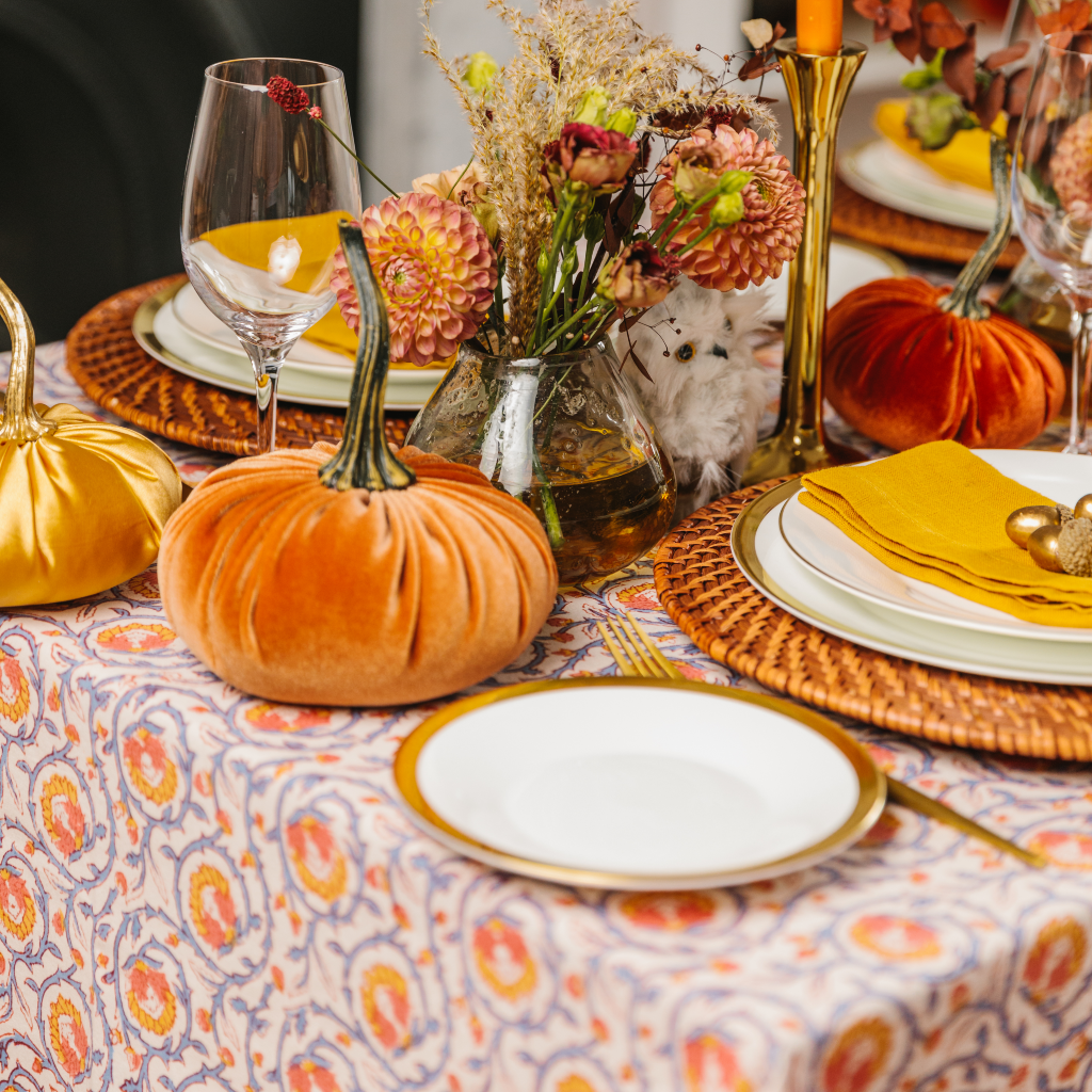 Harvest tablescape with Indian block printed tablecloth, velvet and satin pumpkin decorations