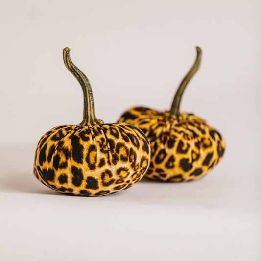 Two luxury leopard print pumpkin home decorations for fall or Hallowe'en