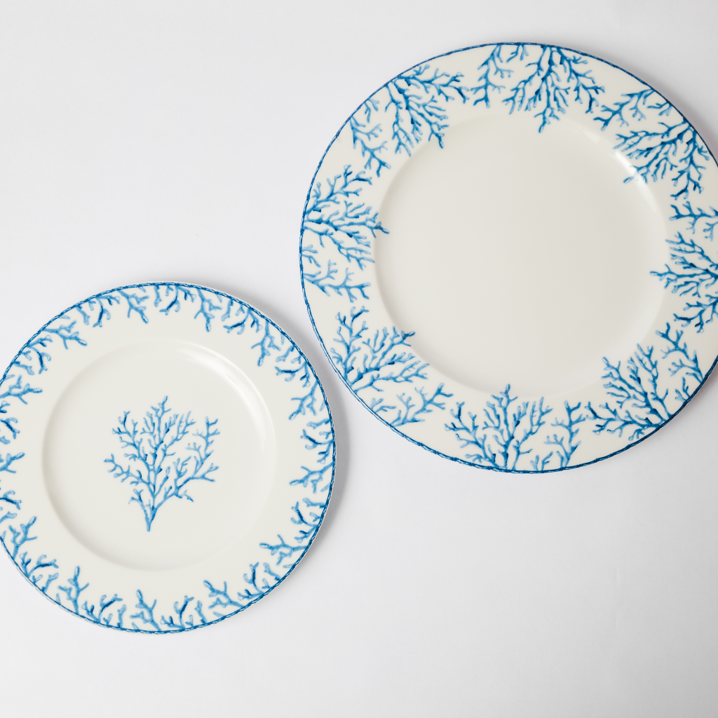 Blue coral painted dinner plate next to blue coral starter plate