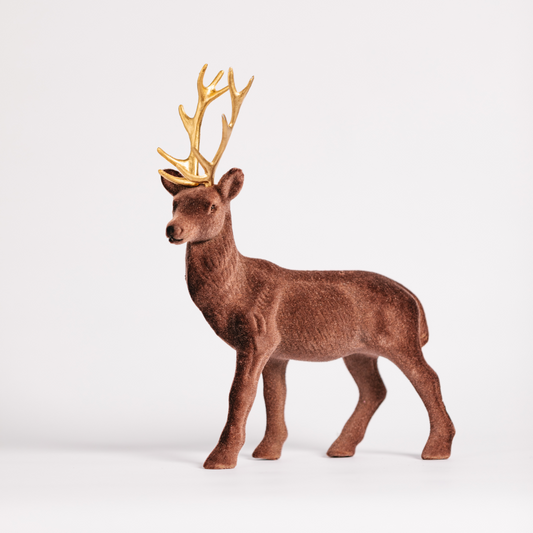 Chocolate brown flocked stag with golden antlers