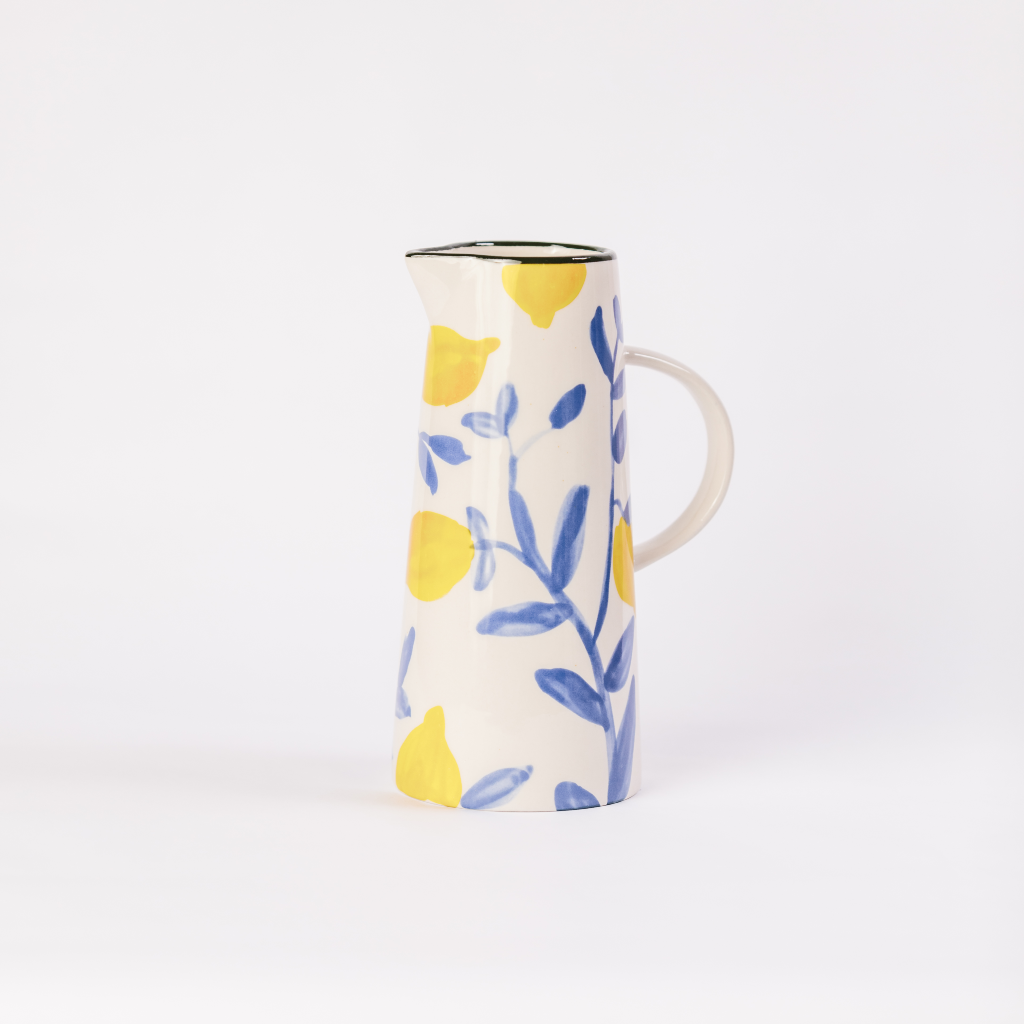 White carafe with yellow lemon and blue twig design