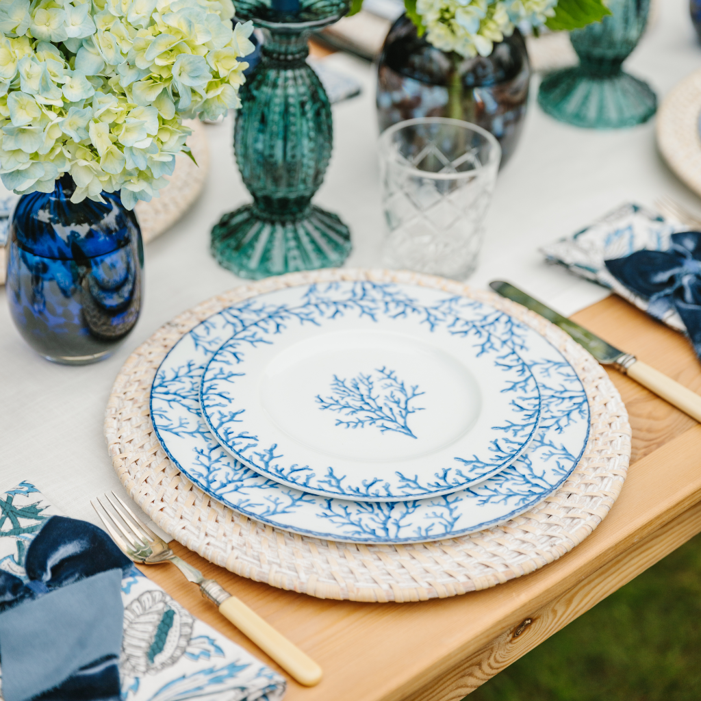 Blue and white porcelain dinner and starter plate set with detailed coral design